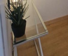 Table with glass top set in Crome