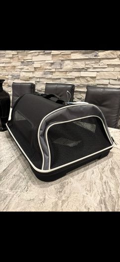 Pet carrier , dog