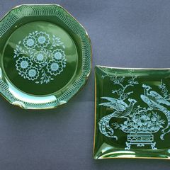 Two Dark Green Glass Dishes with White Transfer-Printed Decoration