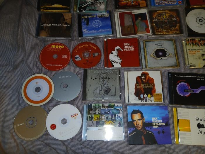 Collection of 58 assorted music CDs