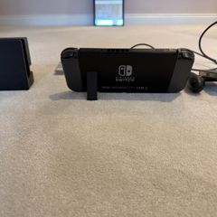 nintendo switch with 2 games