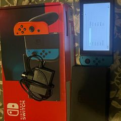 Nintendo switch barely ever used still have box, charger and docking station looking to get rid of