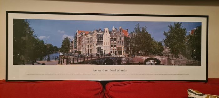 A beautiful black framed panoramic photo of Amsterdam