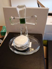 Crystal cross on stand.