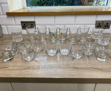 Collection of assorted glass cups and mugs