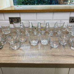 Collection of assorted glass cups and mugs
