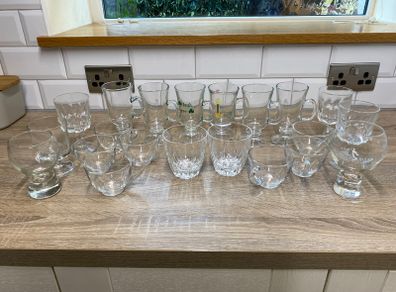 Collection of assorted glass cups and mugs