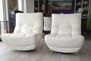 Pair of Leather Swivel Armchairs