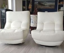 leather swivel armchairs x 2