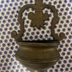 brass holy water font