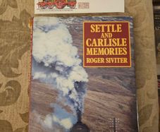 Settle And Carlisle Memories.  By Roger Siviter. 1990 First Edition Large Volume Hardback With Dustjacket In Good Condition.  Plus first day issue stamp.  See Photos For Same.