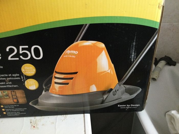 Turbo  lite 250 lawnmore for cutting grass at home  only one time use selling because moving home
