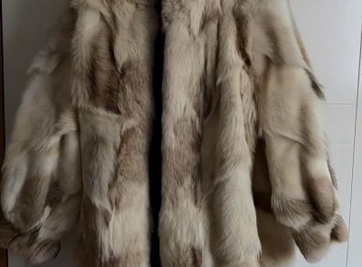 Tan and white vintage fur coat