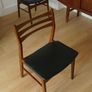 A pair of mid-century teak Danish dining chairs Image 6