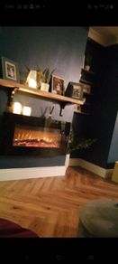 Floating electric fire with heat
