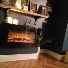 Floating electric fire with heat