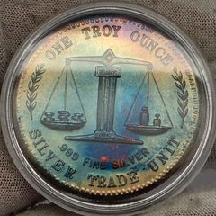 Silver Trade Unit One Troy Ounce .999 Fine Silver Coin Stunning Rainbow Toned Obverse and Reverse