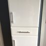 Tall white storage unit with drawer Image 4