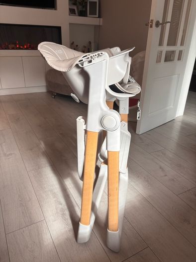 Mash high chair with changeable baby seat.