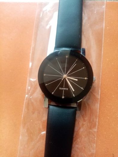 New mens casual watch. Black strap.
