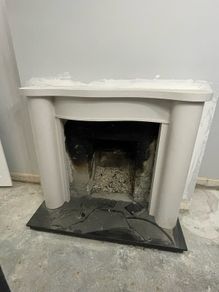 Victorian-style cast iron fireplace insert, surround and hearth