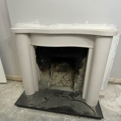 Victorian-style cast iron fireplace insert, surround and hearth
