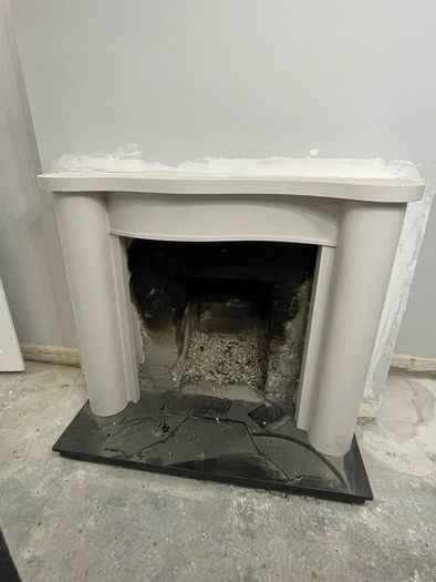 Victorian-style cast iron fireplace insert, surround and hearth