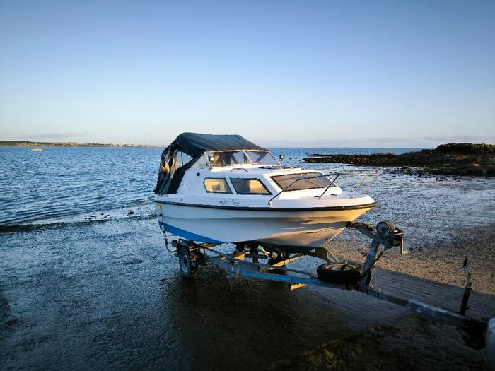 Boat Johnson 90 hp with trailer