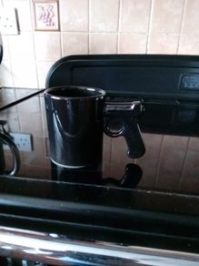 coffee mug with gun handle