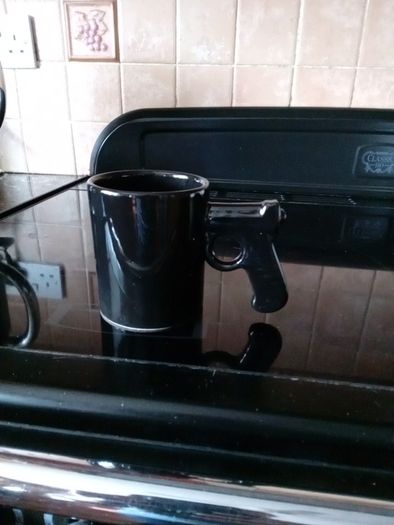 coffee mug with gun handle