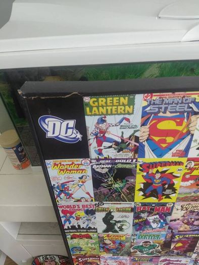 large wooden framed super heroes and villans wall hanging and 2 metal wallhanging discs