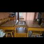 Solid oak extendable dining table with 6 chairs Image 4