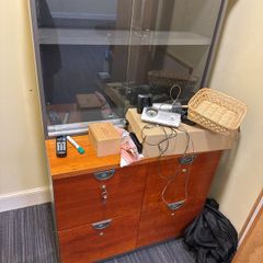 Locking file cabinet with keys