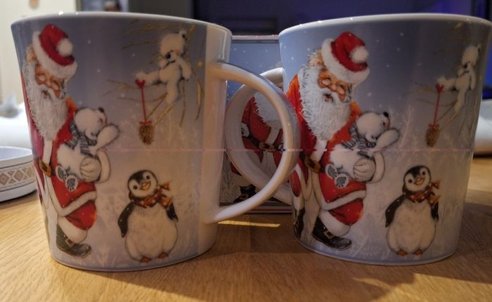 Boxed Set of 2 Santa Claus, Penguin and Polar Bear Mugs