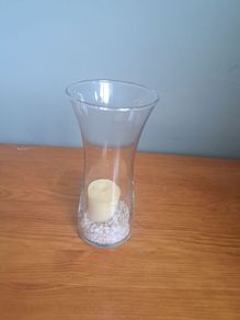 Glass Vase with white pebbles
