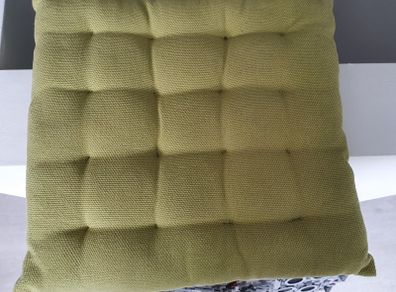 Six lime green garden seat cushions