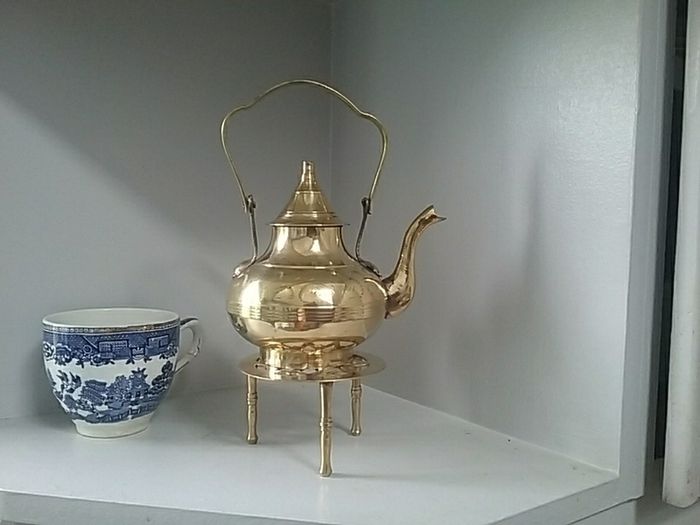 Brass Teapot on a Trivet