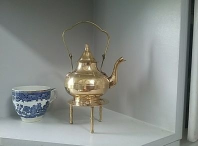 Brass Teapot on a Trivet