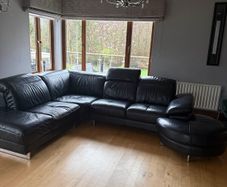 Corner leather sofa, footstool and arm chair