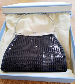 Newbridge black evening bag in box.