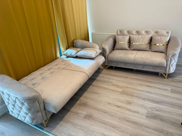 set of sofas with storage and cushions included