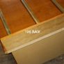 Chest with suitcase set down on top Image 7