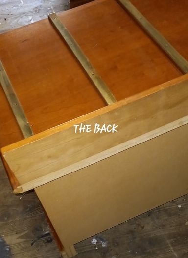 Chest with suitcase set down on top