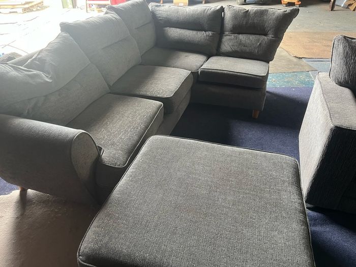 grey corner sofa with matching footstool