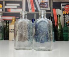 210 - Set of Two Vintage Cork Distilleries Company Clear Glass Decorative Collectible Whiskey Vodka Bottles