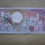Suriname. Aunc 100 Gulden (1986) Image 2