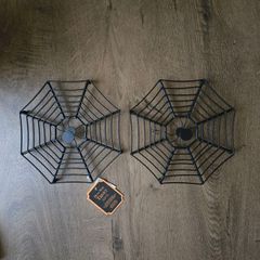Two Halloween metal wire trivets