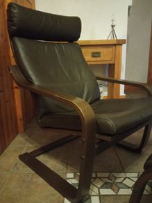 Two IKEA Poang brown leather armchairs