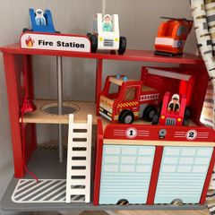 Wooden fire station and emergency vehicles