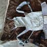 Baby feeding high chair + ergobaby child carrier. Image 5